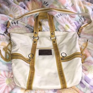 Cream & Mustard coach purse.